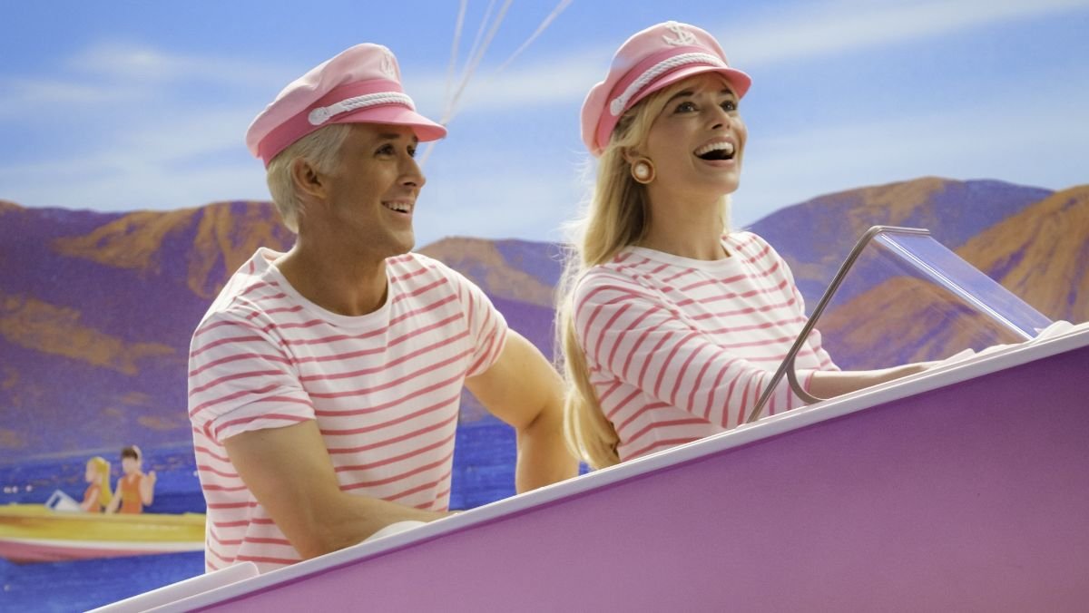 Barbie and Ken sailing into the real world from Barbie Land
