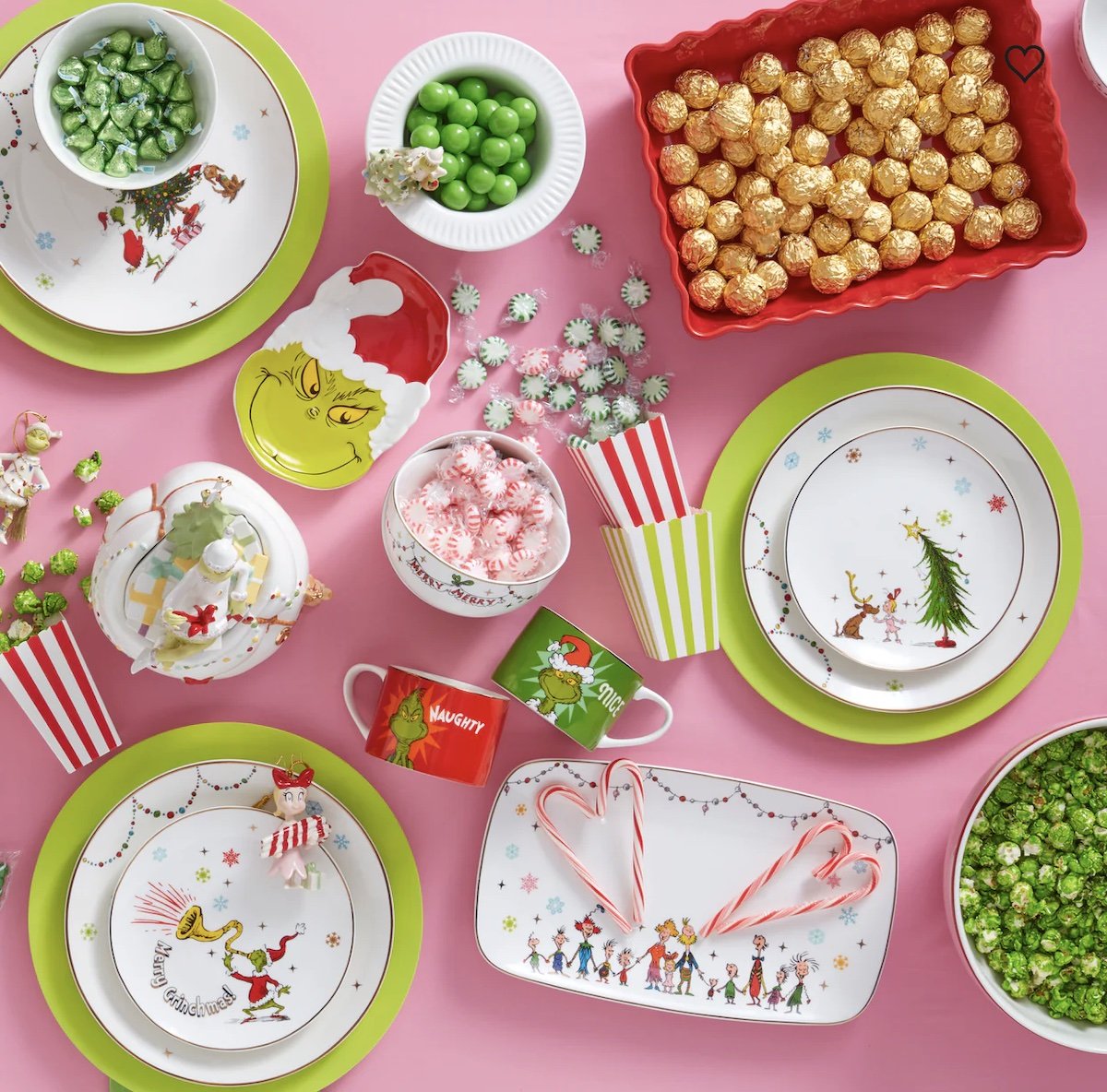 A collection of Grinch-themed items and holiday decor in a promo photo from Lenox