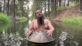 Man Playing a Handpan in the Water Is Chill AQUAMAN Vibes