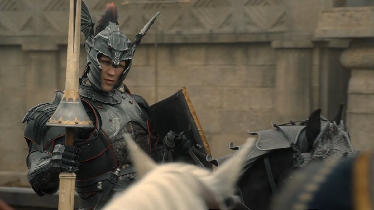 Matt Smith as Daemon Targaryen on horseback wearing his dragon helmet and suit of armor on House of the Dragon