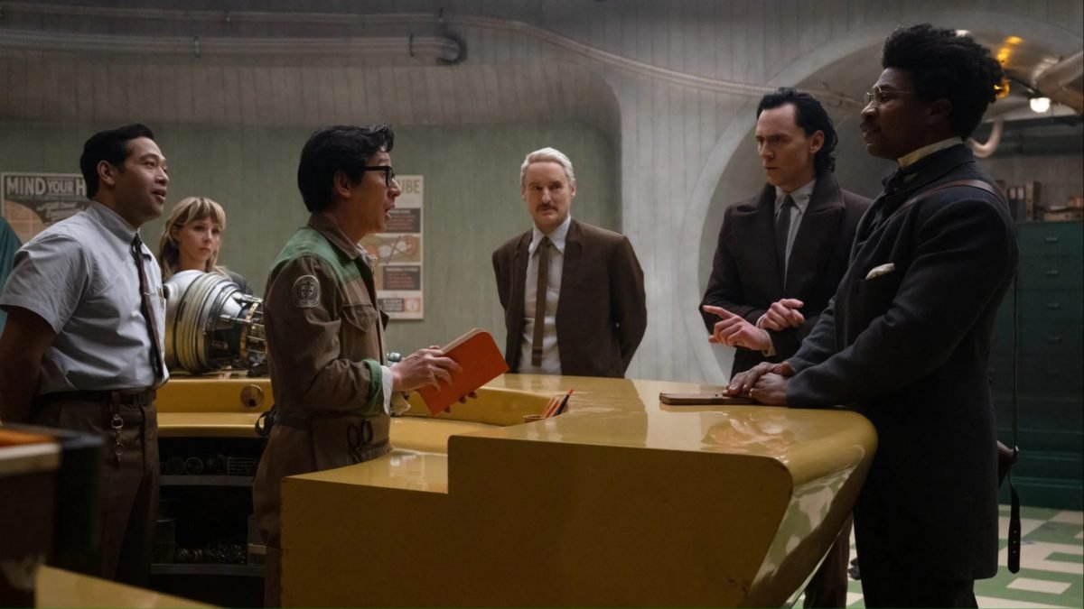 O.B. (Ke Huy Quan) and Victor Timely (Jonathan Majors) meet in the TVA on Loki. 